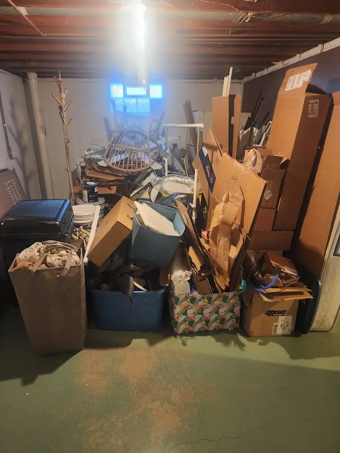 Roll-off dumpster container at job site for Yard Waste Dumpster Rental in North Canaan